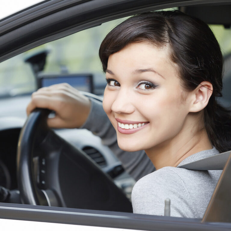 Pretty girl in a car